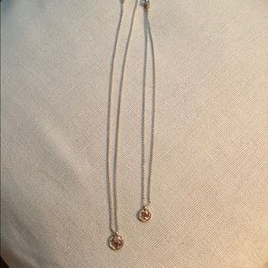Two goldtone coin necklaces